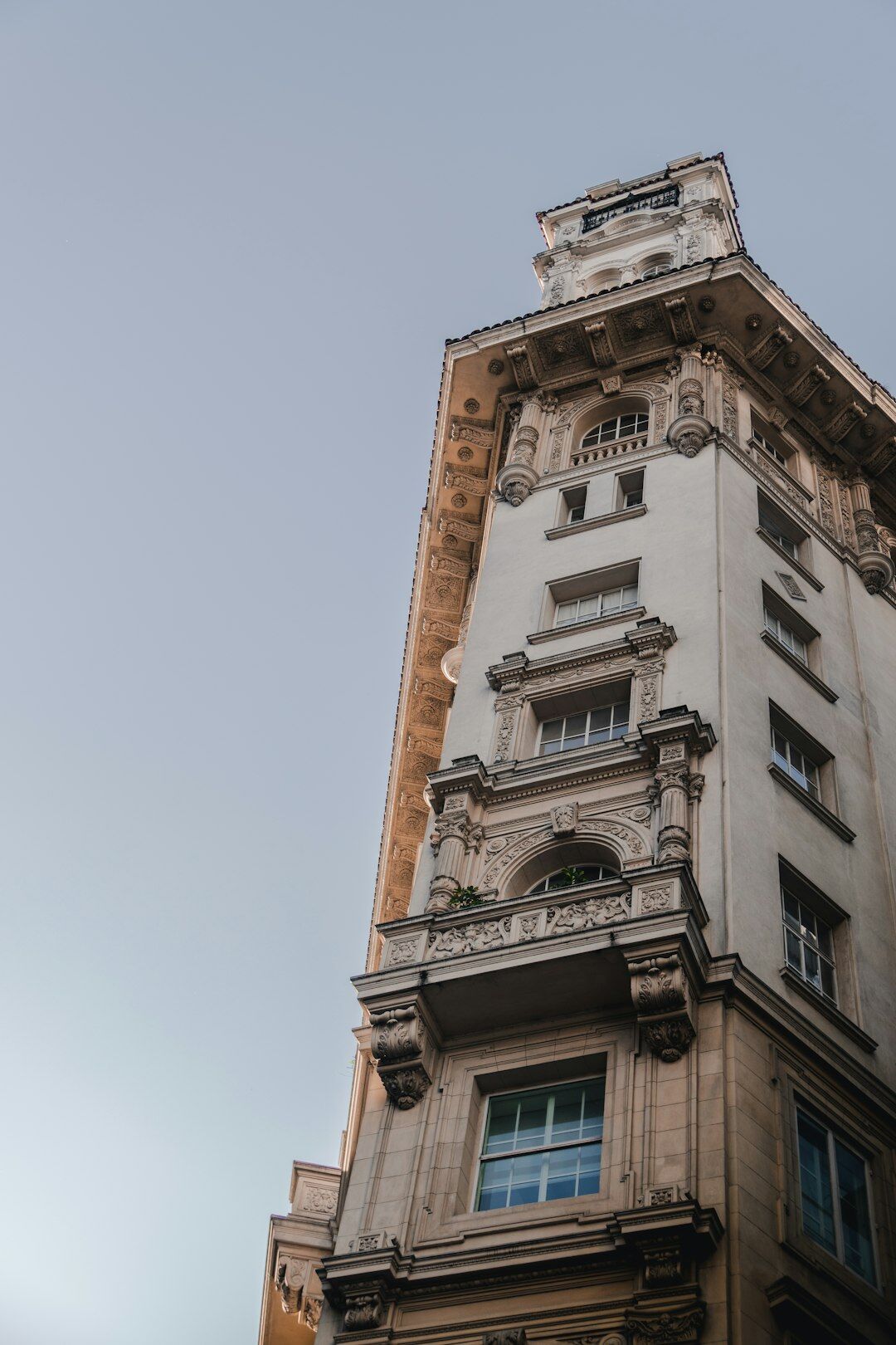 Art deco building facade in downtown Buenos Aires with dramatic shadows